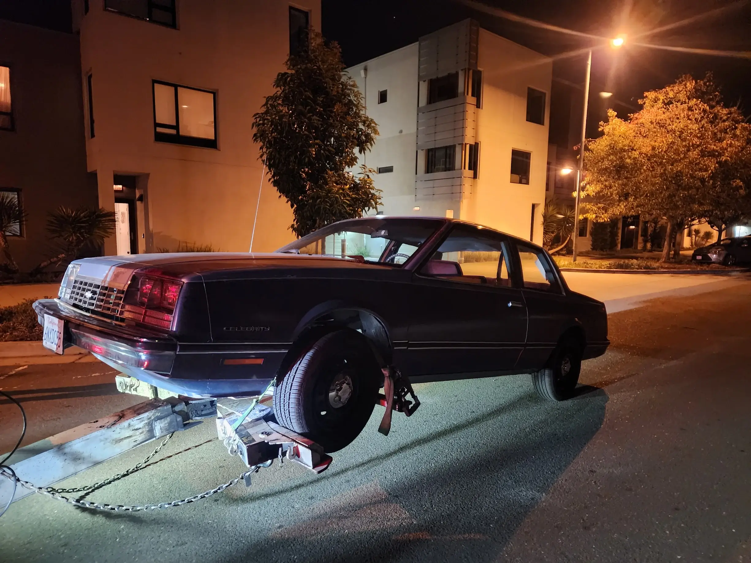 A car that is parked on the side of the road.