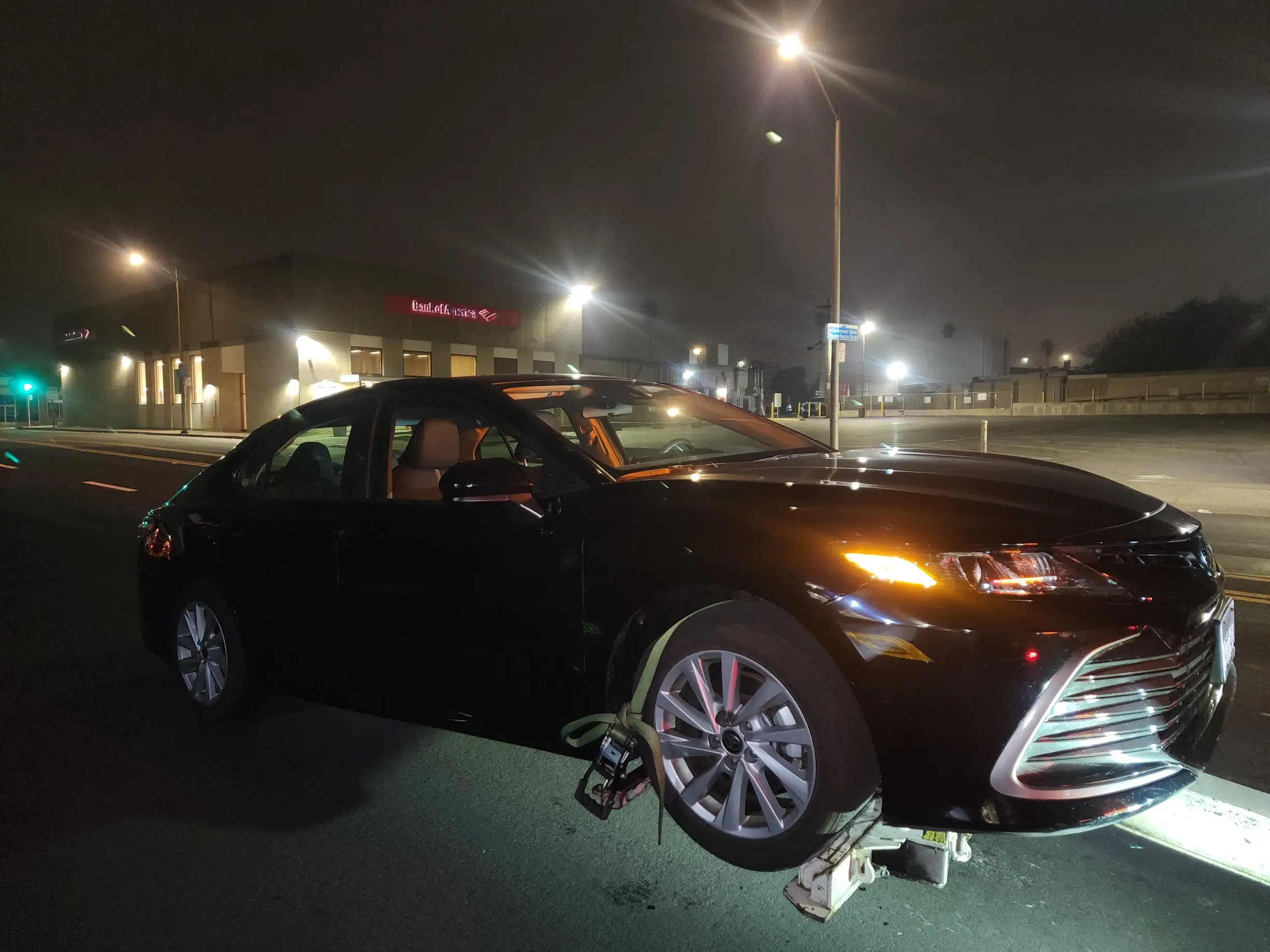 A car that is sitting on the ground.