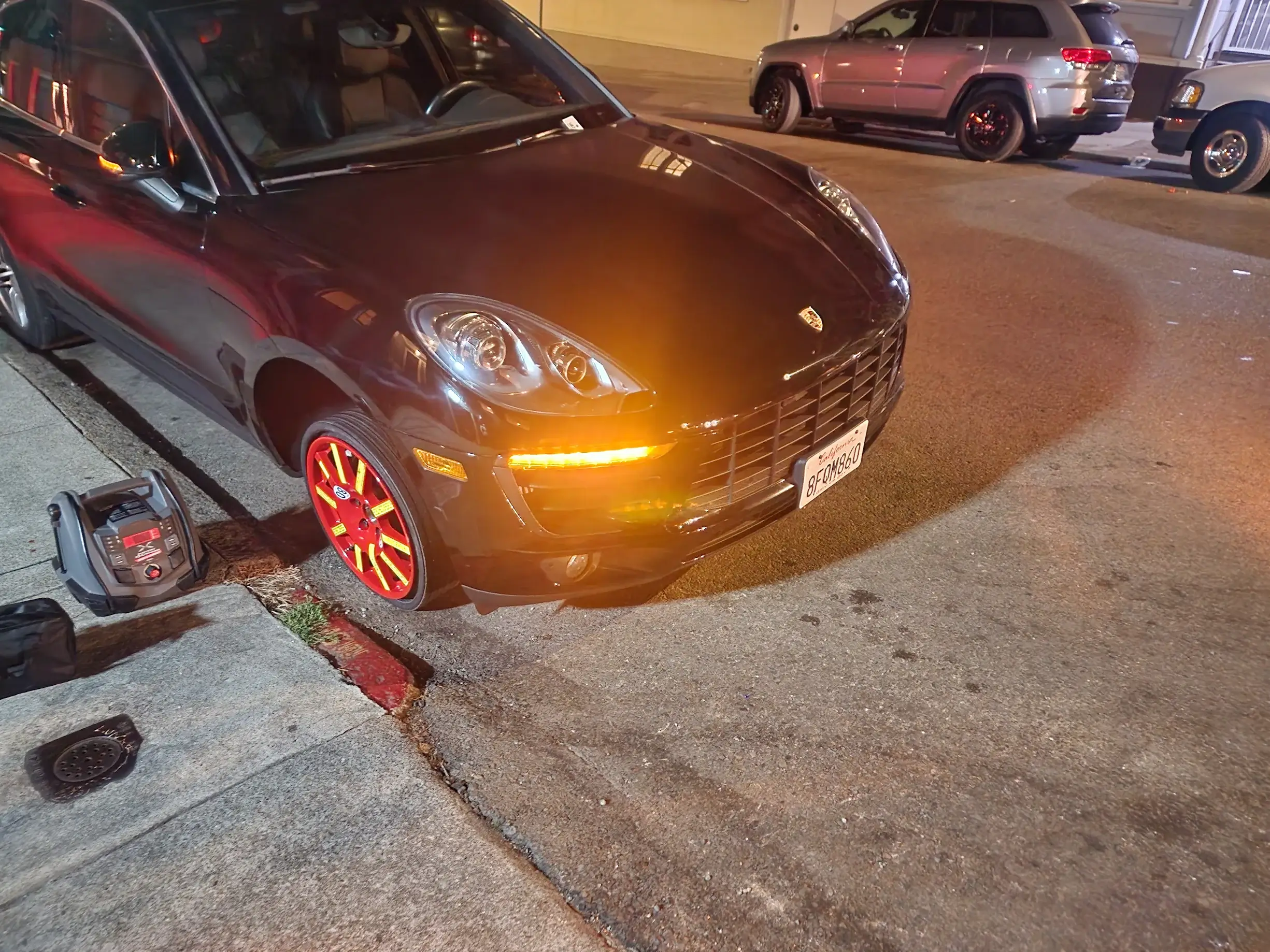 A car parked on the side of a road.